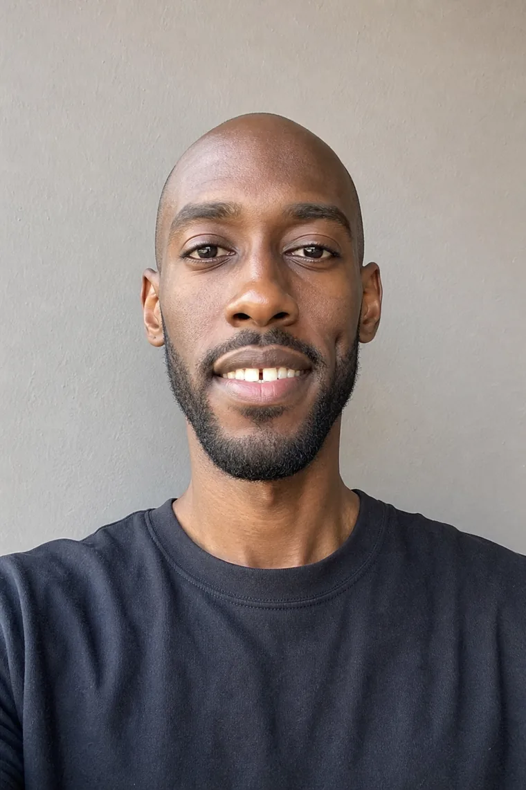 Synthetic source portrait for case 07, a 31-year-old dark-skinned Black man